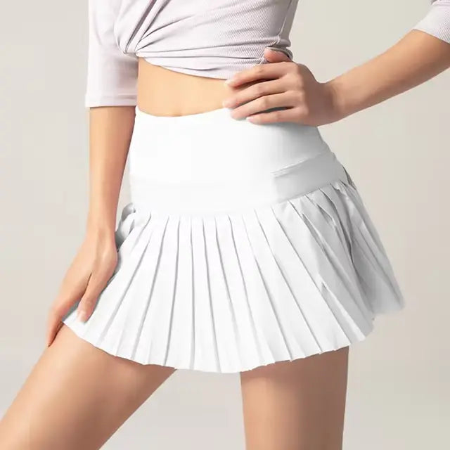 Onyx Flow Pleated Athletic Skirt – Built-In Shorts & Pockets